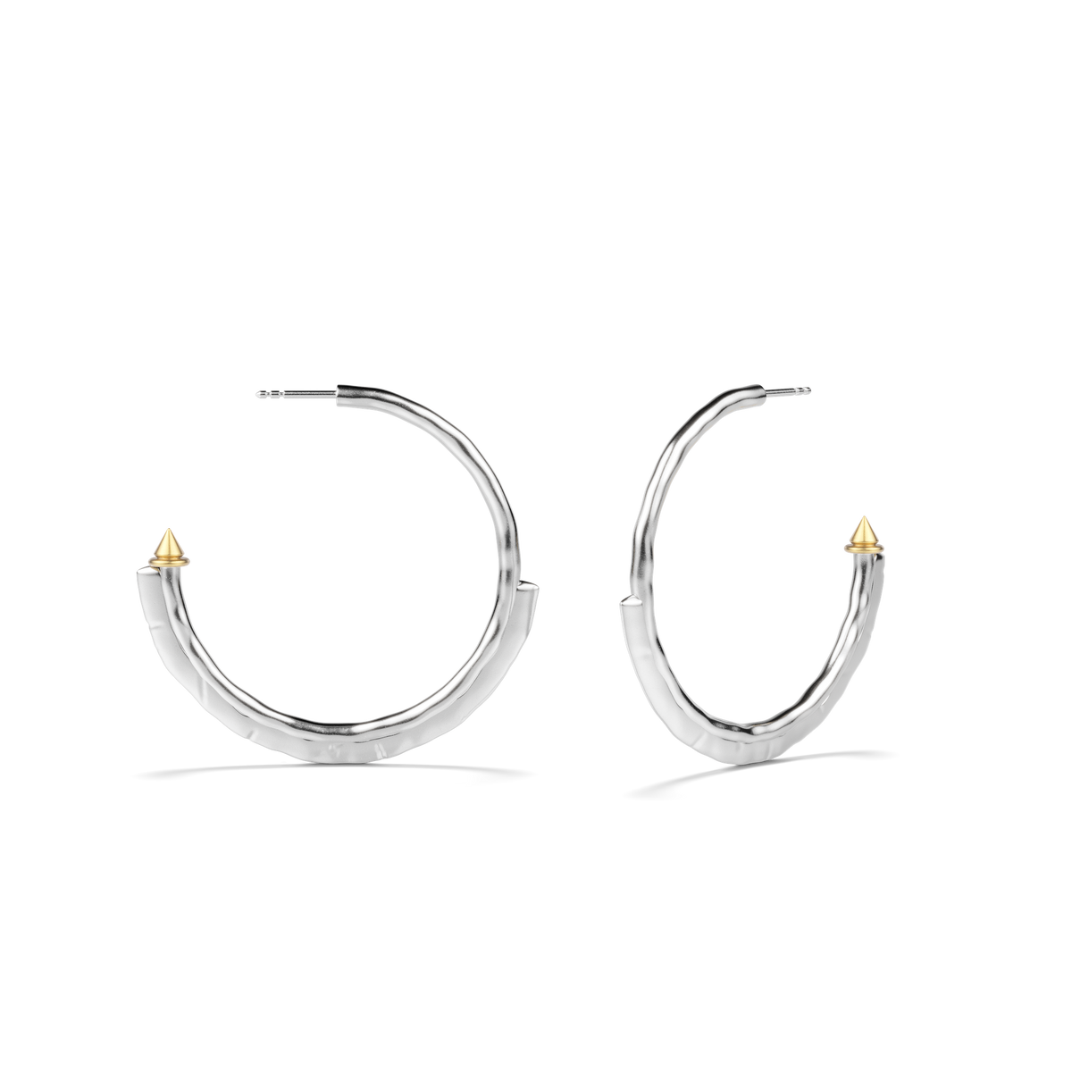 Harlow Arch Hoop Earrings in sterling silver from a second angle, showing the post and hammered texture