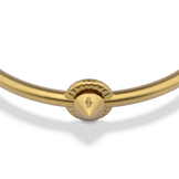 Close-up of the signature stud on the Harlow Stud Cuff Bracelet in 14k gold plate