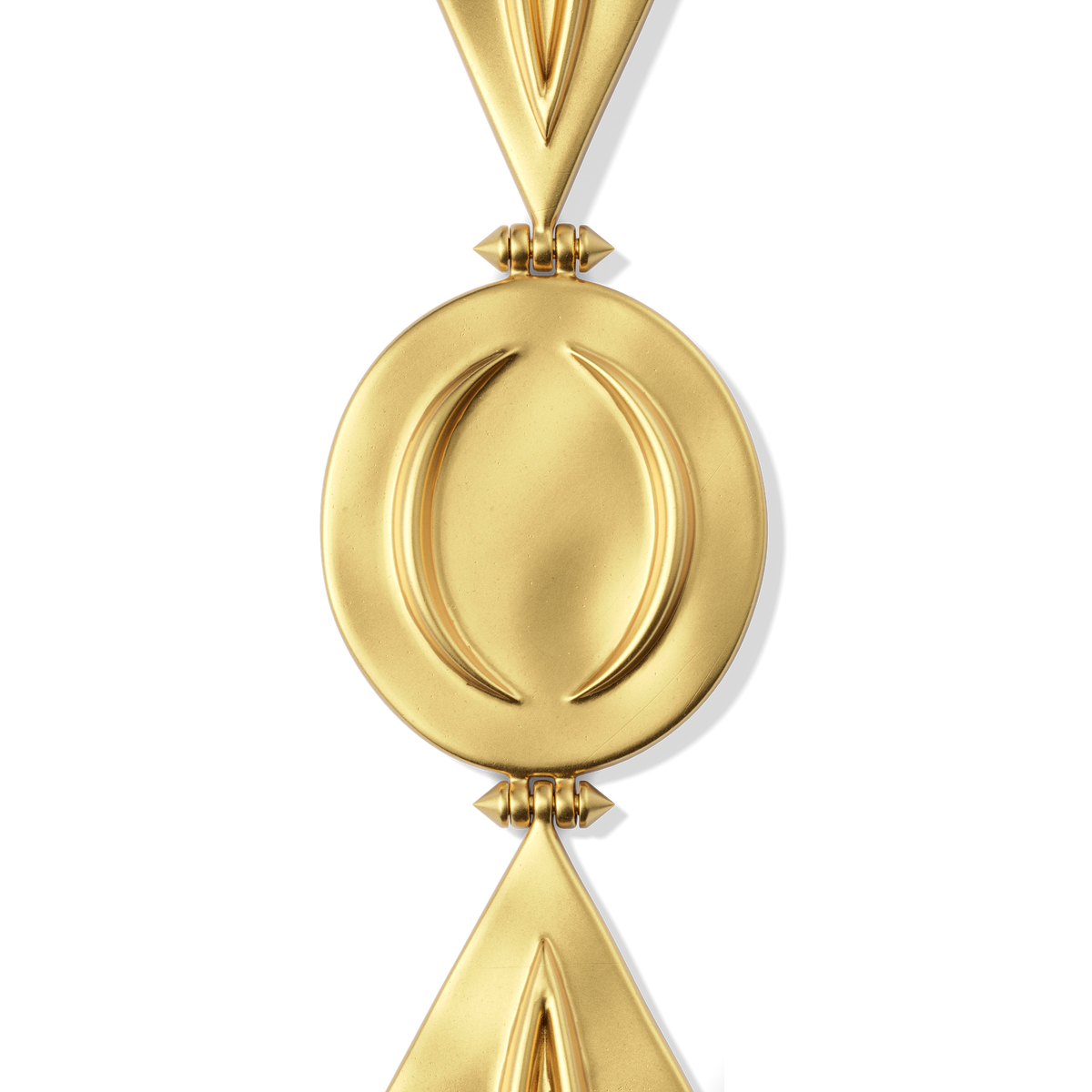 Close-up of the hammered disc and arch elements on the Harlow Arch Drop Earrings in 14k gold plate