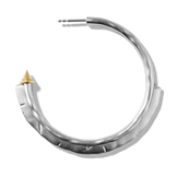 Close-up of a single Harlow Arch Hoop in sterling silver, showing the hammered arch and stud tip