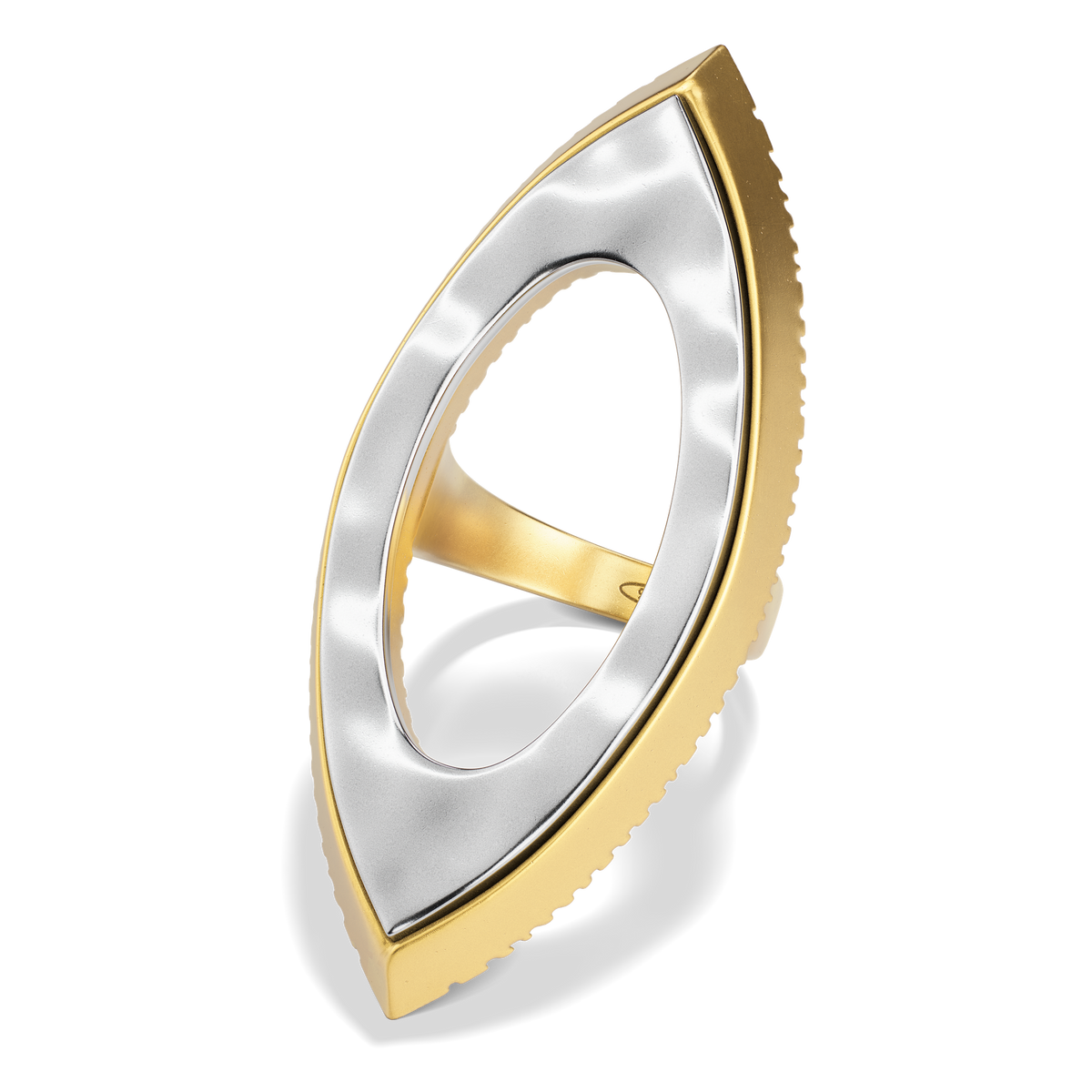 Close-up of the Harlow Open Arch Ring, the hammered silver face and serrated gold edge
