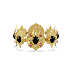 Hathor Hinged Bracelet shown front on, gold links set with black onyx and red jasper cabochons