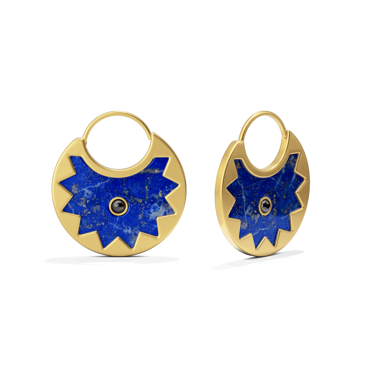 Sunburst Huggie Earrings in 14k gold plate with a lapis half-sun and black onyx center on a slim hoop, three-quarter view