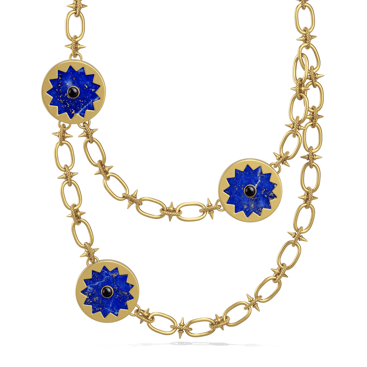 Sunburst Layering Necklace in 14k gold plate with three lapis sun medallions and black onyx centers on a spiked link chain, front view