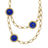 Sunburst Layering Necklace in 14k gold plate with three lapis sun medallions and black onyx centers on a spiked link chain, front view