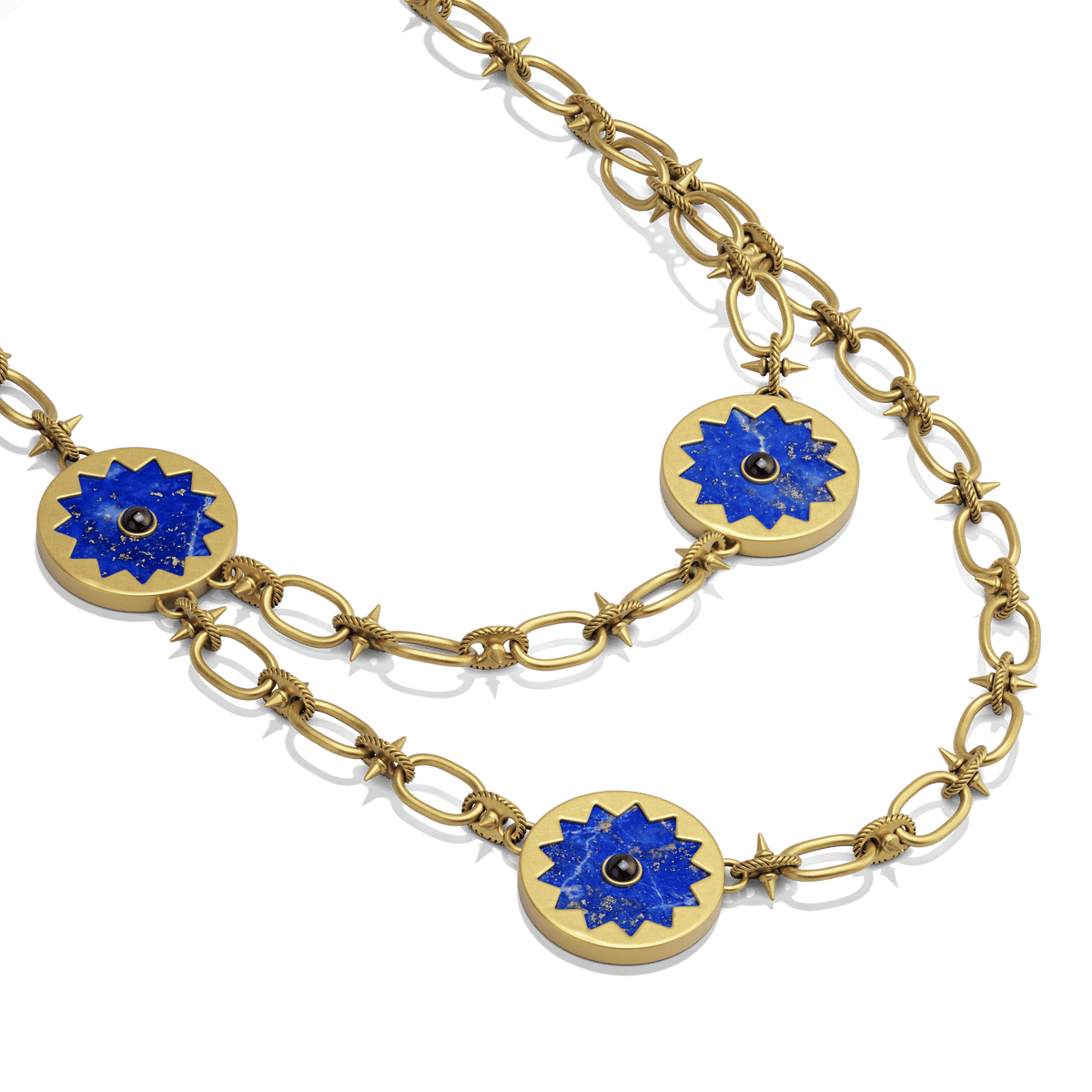 Sunburst Layering Necklace in 14k gold plate with three lapis sun medallions on a spiked link chain, three-quarter view