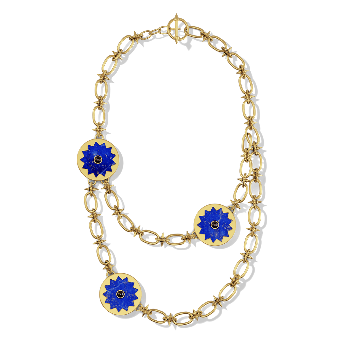 Sunburst Layering Necklace in 14k gold plate with three lapis sun medallions on a spiked link chain, top view