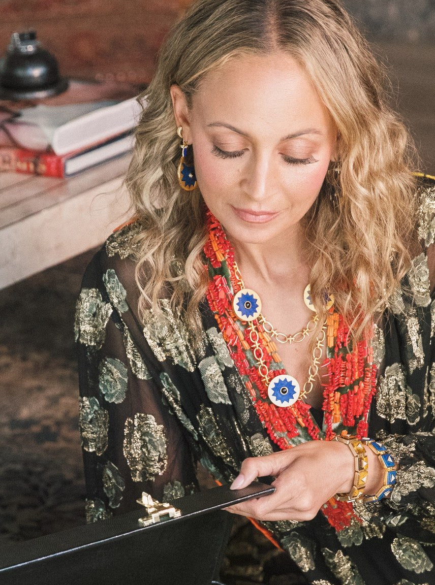 Nicole Richie wearing the Sunburst Layering Necklace and Drop Earrings in blue lapis