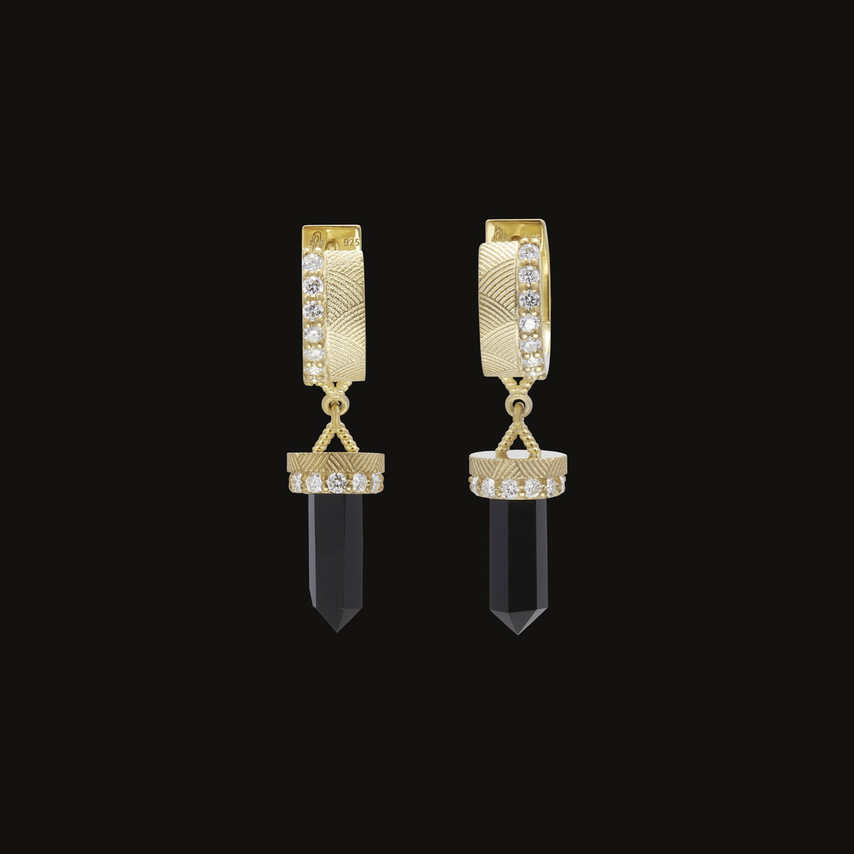 Nova Crystal Diamond Huggie Earrings in black onyx and 14k gold with white diamonds, on a black background