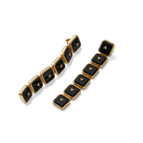 House of Harlow Nova Stacker Drop Earrings in 14k gold with black onyx and white diamonds, flat lay