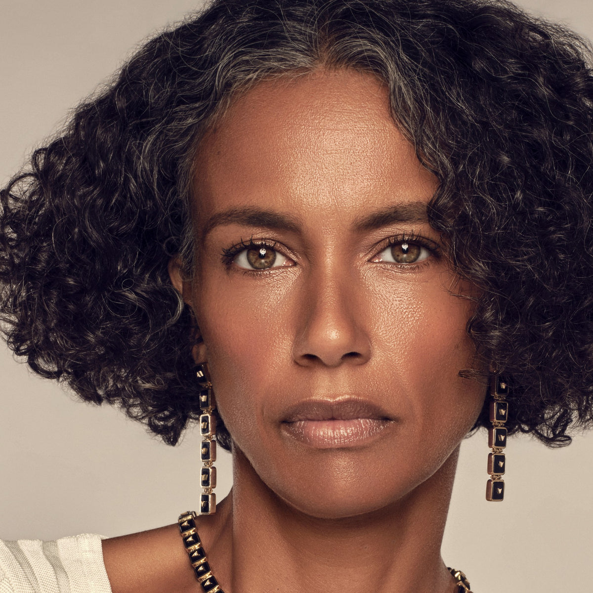Model wearing the Nova Stacker Drop Earrings in black onyx with the Nova Collar Necklace